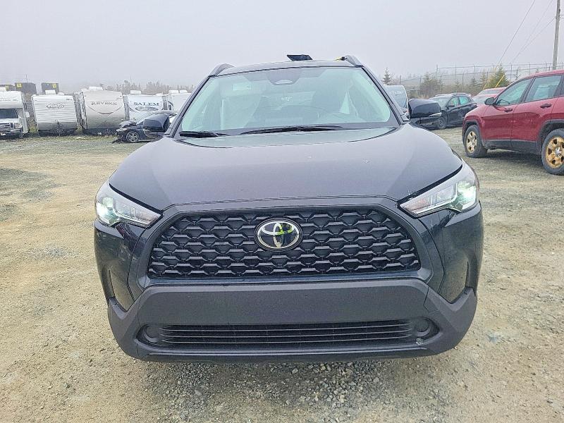 2024 Toyota Corolla cross VIN 7MUBAABG5RV087528 COPART salvage auction — SIDE, NS - SALVAGE TITLE, sold $7,600 on 2026-07-23 (photo 5)