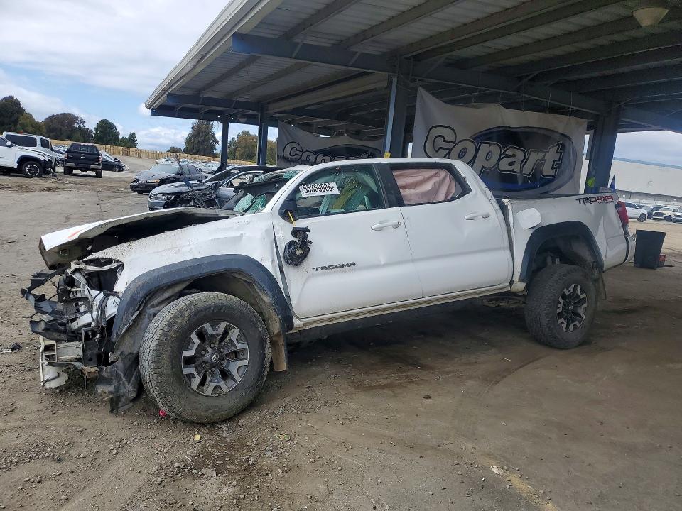 2019 Toyota Tacoma VIN 5TFCZ5AN9KX188554 COPART salvage auction — ROLLOVER, CA - NON-REPAIRABLE VEHICLE CERT, sold $300 on 2026-07-21 (photo 1)