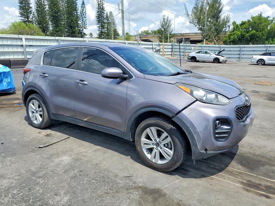 2018 Kia Sportage VIN KNDPMCAC9J7370546 COPART salvage auction — SIDE, FL - CERT OF TITLE SLVG REBUILDABLE, sold $2,700 on 2026-07-15 (photo 4)