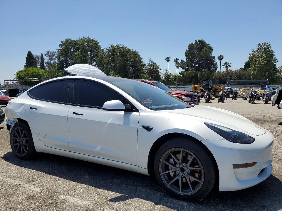 2023 Tesla Model 3 VIN 5YJ3E1EA2PF587769 COPART salvage auction — REAR END, CA - SALVAGE CERTIFICATE, sold $9,500 on 2026-07-28 (photo 4)