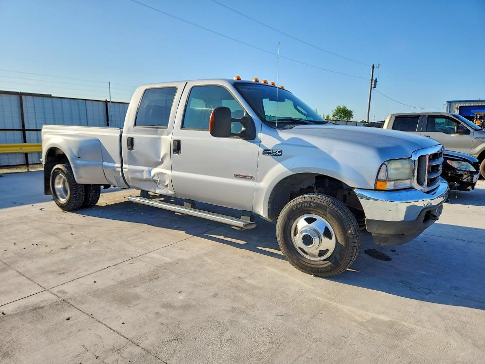 2004 Ford F-350 super duty VIN 1FTWW33PX4ED89547 COPART salvage auction — MECHANICAL, Tx - Salvage Vehicle Title (P), sold $2,600 on 2026-07-02 (photo 4)
