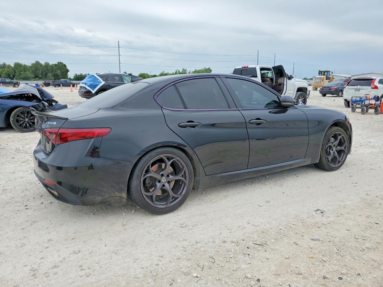 2018 Alfa Romeo Giulia VIN ZARFAECN8J7599479 COPART salvage auction — Side, TX - SALVAGE VEHICLE TITLE, sold $2,200 on 2026-07-09 (photo 3)
