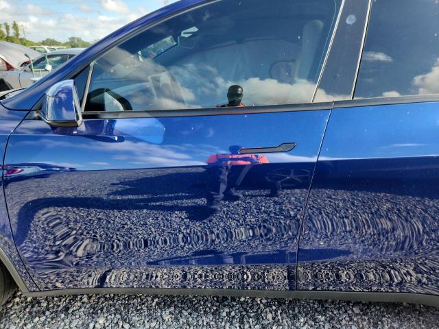 2026 Tesla Model y VIN 7SAYGDED5TF524612 COPART salvage auction — SIDE, Fl - Cert Of Title Slvg Rebuildable, sold $22,300 on 2026-07-10 (photo 7)