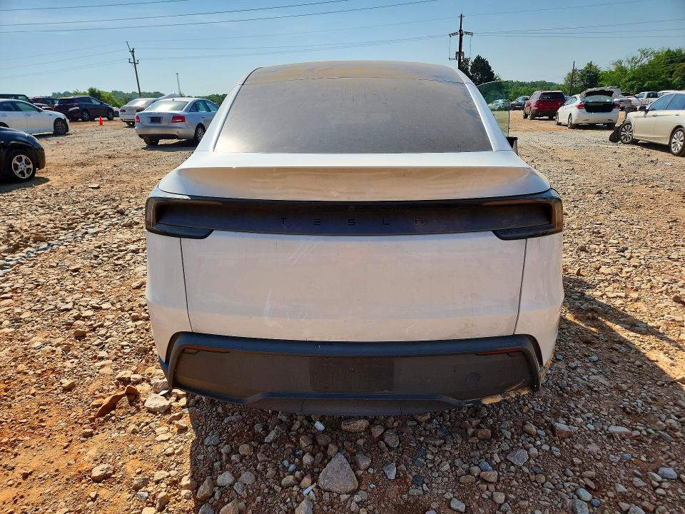 2026 Tesla VIN 7SAYGDED1TA431518 COPART salvage auction — WATER/FLOOD, Nc - Salvage Certificate Of Title, sold $1,700 on 2026-07-27 (photo 6)