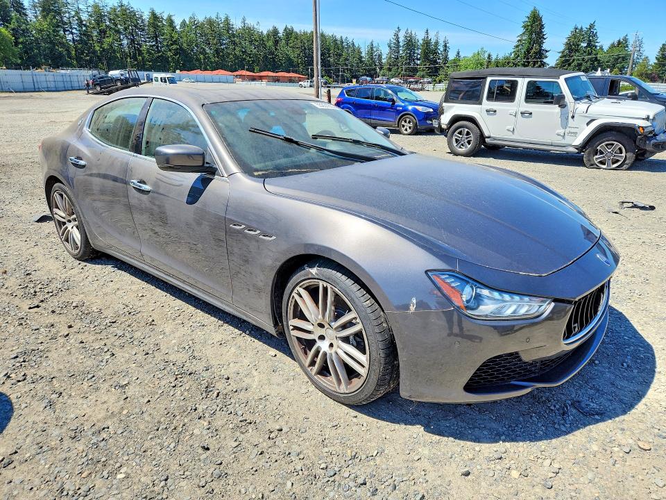 2014 Maserati Ghibli VIN ZAM57RTA7E1113595 COPART salvage auction — MECHANICAL, WA - CERT OF OWNERSHIP-REBUILT, sold $350 on 2026-08-07 (photo 4)