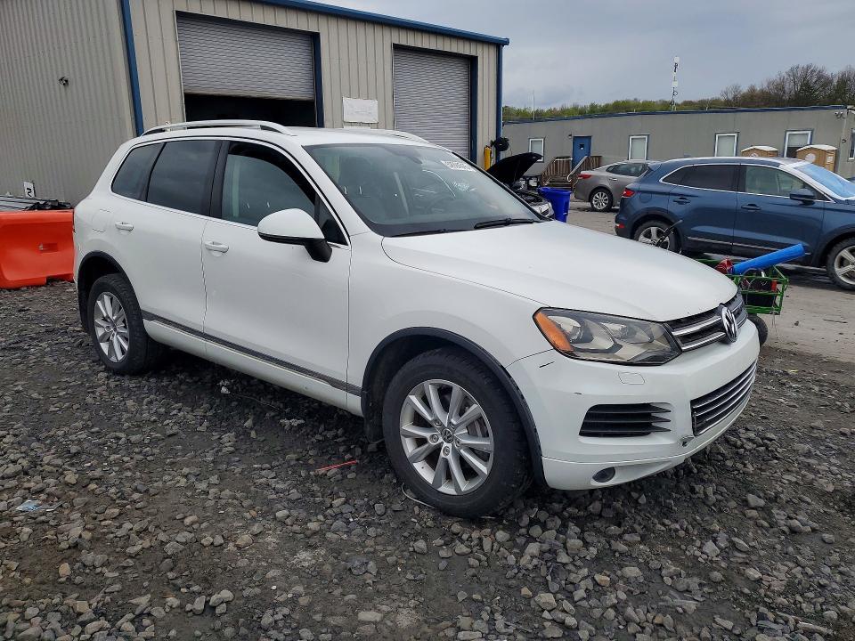 2014 Volkswagen VIN WVGEP9BP6ED013038 COPART salvage auction — MECHANICAL, Nj - Certificate Of Title, sold $3,550 on 2026-07-08 (photo 4)