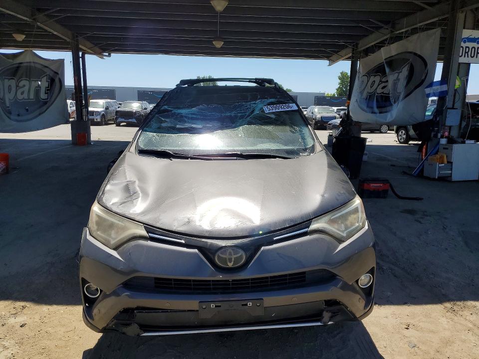 2016 Toyota Rav4 VIN JTMWFREV9GJ084180 COPART salvage auction — ALL OVER, Ca - Salvage Certificate, sold $2,450 on 2026-07-02 (photo 5)