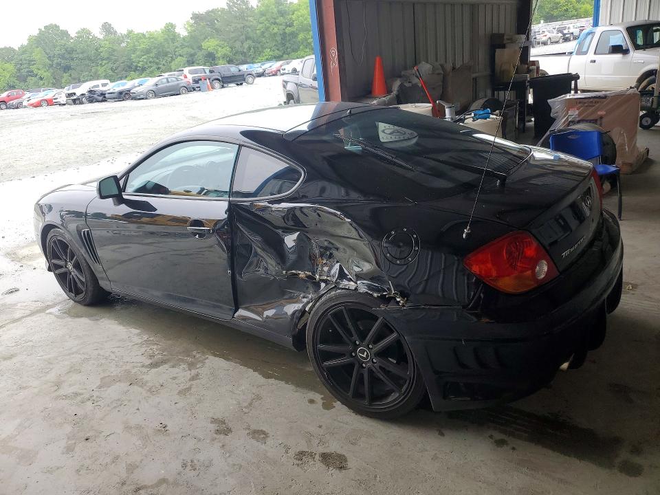 2004 Hyundai Tiburon VIN KMHHM65D04U107498 COPART salvage auction — SIDE, Nc - Salvage Certificate Of Title, sold $200 on 2026-07-08 (photo 2)