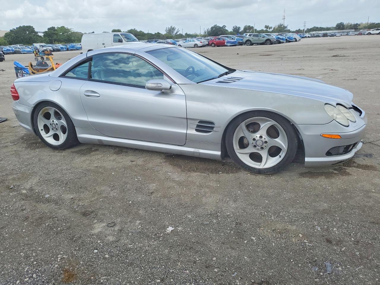 2004 Mercedes-Benz SL-Class VIN WDBSK75F04F065151 COPART salvage auction — Minor Dent/Scratches, FL - CERT OF TITLE-REBUILT, sold $400 on 2026-06-30 (photo 4)