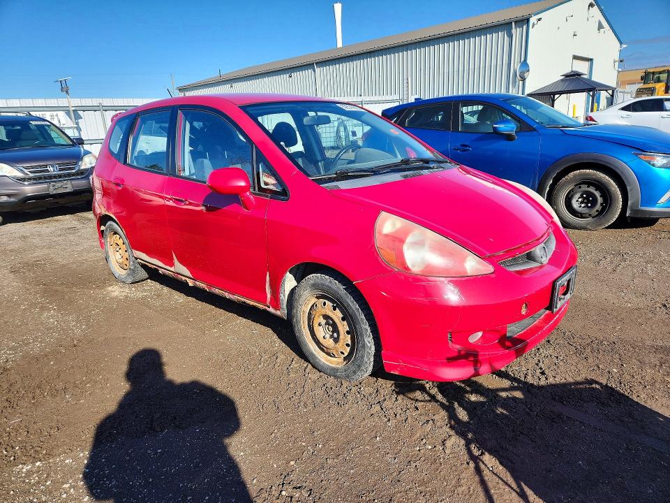 2007 Honda Fit VIN JHMGD38687S819235 COPART salvage auction — SIDE, On - Permit Rebuilt - Unfit, sold $375 on 2026-07-28 (photo 4)