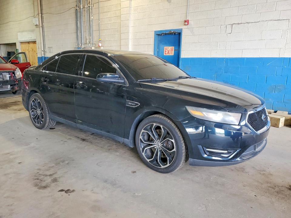 2014 Ford Taurus VIN 1FAHP2KT3EG136077 COPART salvage auction — REAR END, Mi - Cert Of Title-Rebuilt Salvage, sold $2,100 on 2026-07-02 (photo 4)