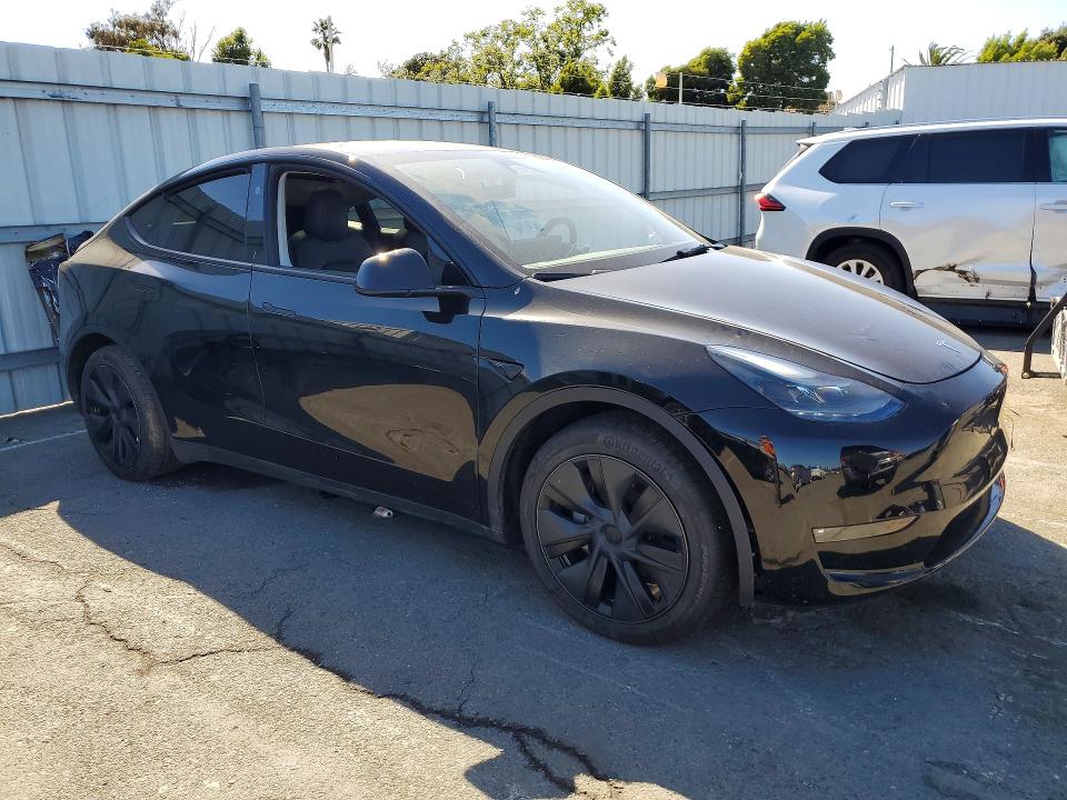 2024 Tesla Model y VIN 7SAYGDEEXRF115135 COPART salvage auction — SIDE, Ca - Salvage Certificate, sold $13,400 on 2026-07-31 (photo 4)