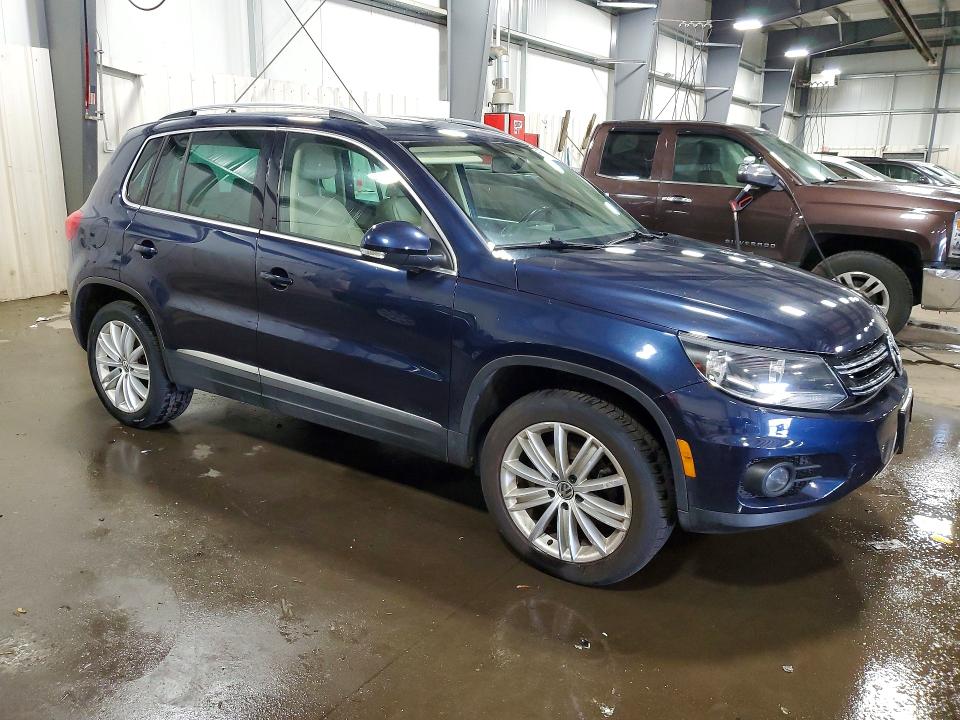 2015 Volkswagen Tiguan VIN WVGBV7AX3FW553533 COPART salvage auction — VANDALISM, Mn - Cert Of Title-Prior Salvage, sold $2,050 on 2026-08-11 (photo 4)