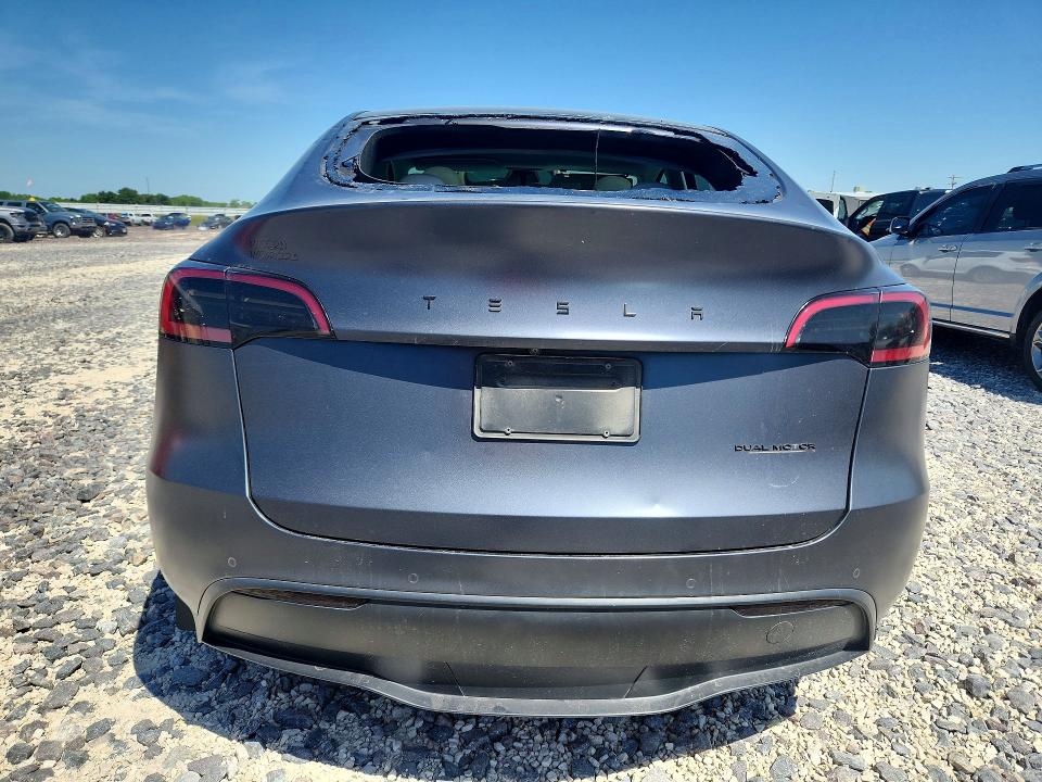 2022 Tesla Model y VIN 7SAYGDEF6NF336573 COPART salvage auction — HAIL, Mo - Certificate Of Title, sold $15,800 on 2026-07-08 (photo 6)