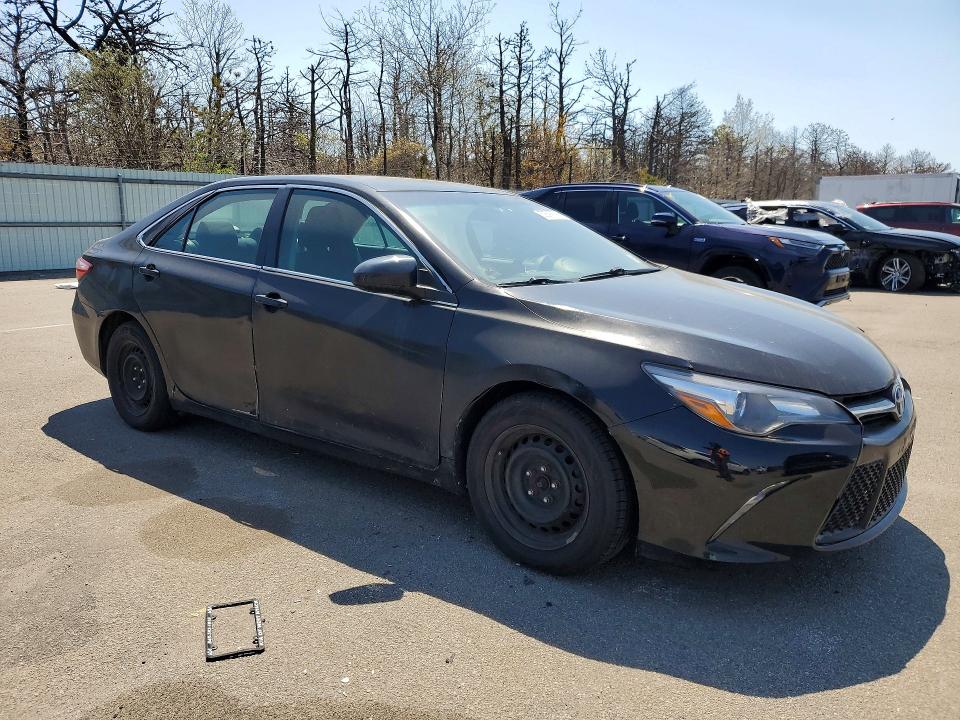 2016 Toyota Camry hybrid VIN 4T1BD1FK7GU190583 COPART salvage auction — MINOR DENT/SCRATCHES, Ny - Certificate Of Title, sold $1,000 on 2026-07-08 (photo 4)