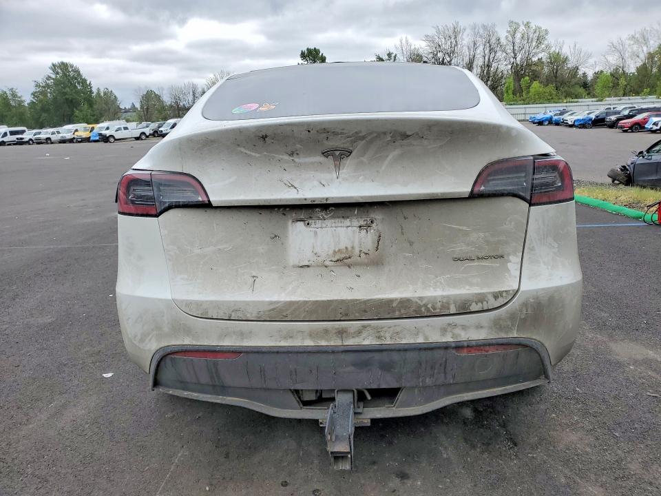 2023 Tesla Model y VIN 7SAYGDEE3PF909035 COPART salvage auction — SIDE, Or - Salvage Title Certificate, sold $8,000 on 2026-07-08 (photo 6)