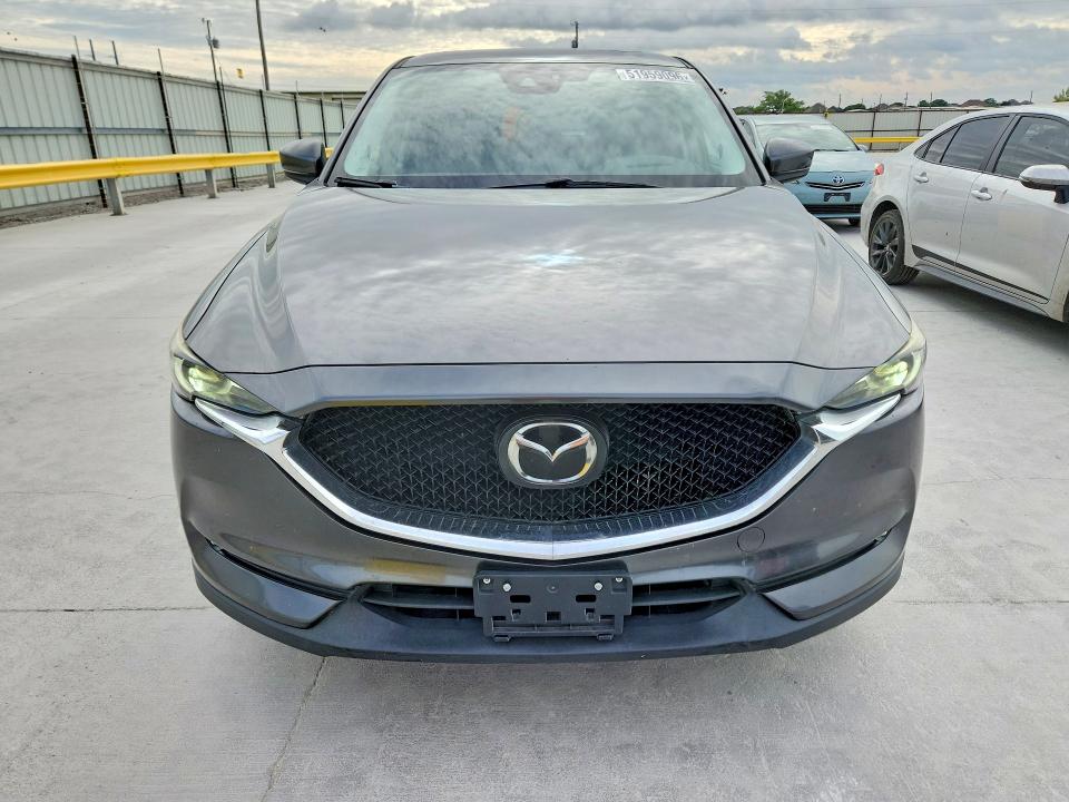 2017 Mazda Cx-5 VIN JM3KFADL9H0179823 COPART salvage auction — MINOR DENT/SCRATCHES, Tx - Salvage Vehicle Title, sold $2,600 on 2026-07-17 (photo 5)