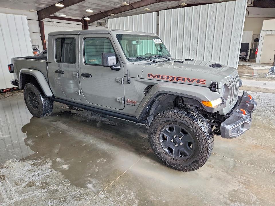 2023 Jeep Gladiator VIN 1C6JJTEG4PL529931 COPART salvage auction — MINOR DENT/SCRATCHES, Il - Certificate Of Title, sold $30,500 on 2026-07-02 (photo 4)