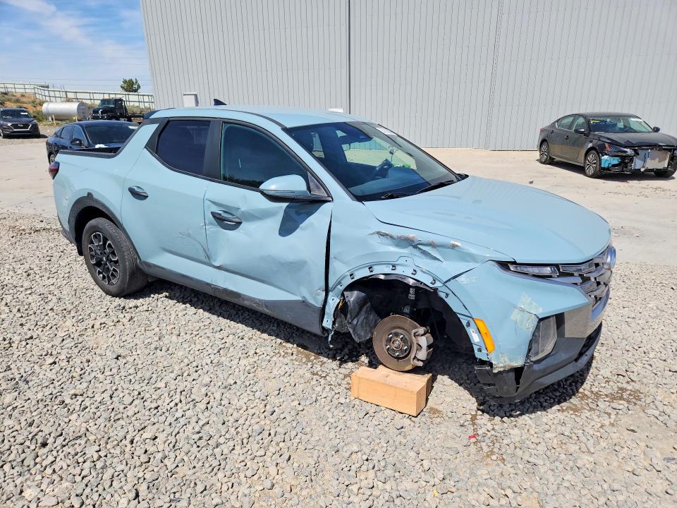 2024 Hyundai Santa cruz VIN 5NTJBDDE6RH110497 COPART salvage auction — SIDE, Nv - Salvage Title, sold $7,500 on 2026-07-09 (photo 4)