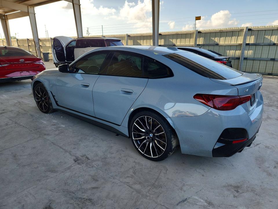 2025 BMW I4 VIN WBY33HD06SFT96110 COPART salvage auction — SIDE, Fl - Cert Of Title Slvg Rebuildable, sold $21,300 on 2026-07-22 (photo 2)