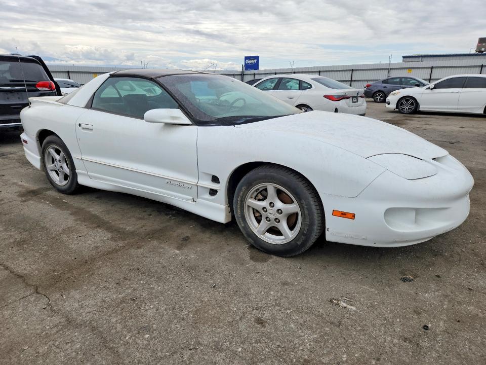 2001 Pontiac Firebird VIN 2G2FS22K212132907 COPART salvage auction — NORMAL WEAR, Tx - Salvage Vehicle Title, sold $225 on 2026-08-14 (photo 4)