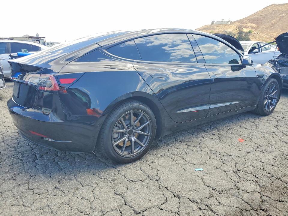 2021 Tesla Model 3 VIN 5YJ3E1EAXMF943011 COPART salvage auction — SIDE, Ca - Salvage Certificate, sold $5,600 on 2026-07-16 (photo 3)