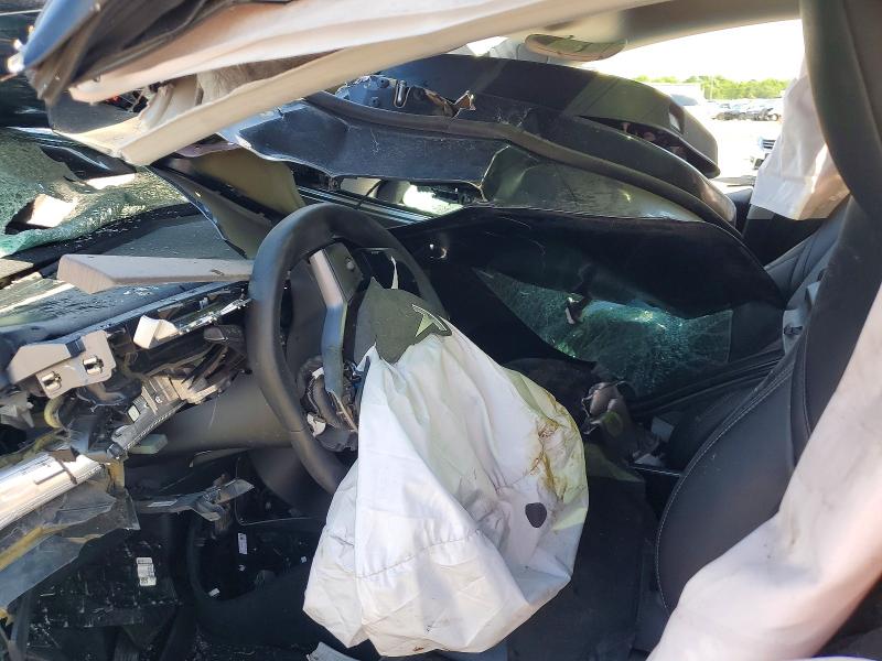 2024 Tesla Model y VIN 7SAYGDEEXRF117354 COPART salvage auction — ALL OVER, CO - SALVAGE TITLE, sold $250 on 2026-07-27 (photo 9)