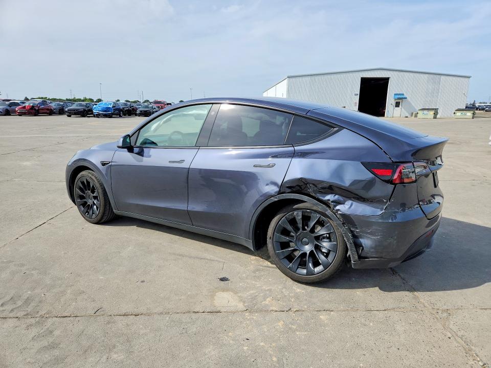 2022 Tesla Model y VIN 7SAYGDEE9NF569774 COPART salvage auction — REAR END, CA - SALVAGE CERTIFICATE, sold $11,400 on 2026-07-06 (photo 2)