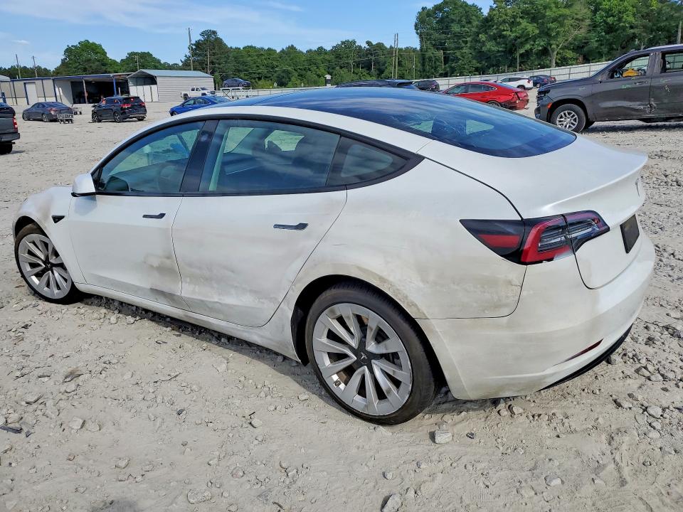 2023 Tesla Model 3 VIN 5YJ3E1EA6PF430844 COPART salvage auction — SIDE, Ga - Cert Of Ttl-Slvg Manufctr Bybk, sold $6,400 on 2026-07-08 (photo 2)