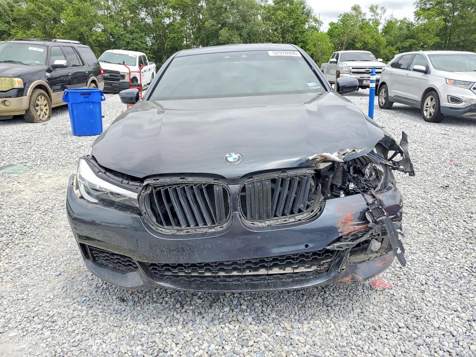 2019 BMW 7er VIN WBA7E2C5XKB217854 COPART salvage auction — FRONT END, Tx - Salvage Vehicle Title, sold $125 on 2026-08-03 (photo 5)