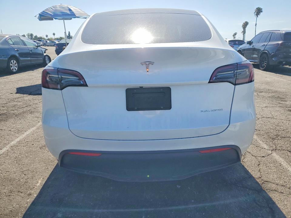 2023 Tesla Model y VIN 7SAYGDEE7PA030635 COPART salvage auction — FRONT END, Ca - Salvage Certificate, sold $13,700 on 2026-07-24 (photo 6)