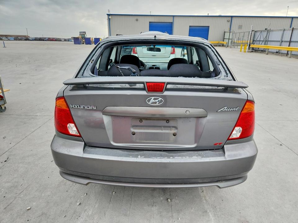 2005 Hyundai Accent VIN KMHCG35C75U322188 COPART salvage auction — HAIL, Tx - Certificate Of Title, sold $150 on 2026-07-28 (photo 6)