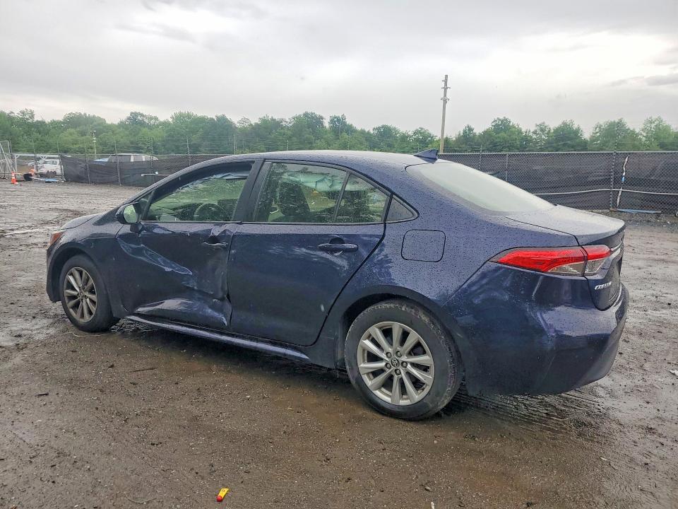 2023 Toyota Corolla VIN JTDB4MEEXPJ000391 COPART salvage auction — SIDE, Salvage Title, sold $4,250 on 2026-07-09 (photo 2)