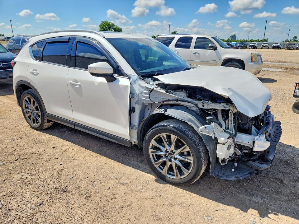 2021 Mazda Cx-5 VIN JM3KFBEY1M0371828 COPART salvage auction — FRONT END, TX - SALVAGE VEHICLE TITLE, sold $5,400 on 2026-07-08 (photo 4)