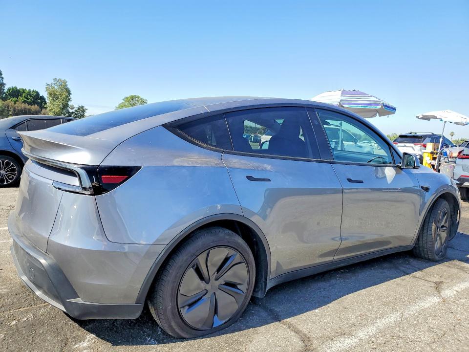 2026 Tesla Model y VIN 7SAYGDED7TF416136 COPART salvage auction — SIDE, Ca - Salvage Certificate, sold $18,000 on 2026-07-17 (photo 3)