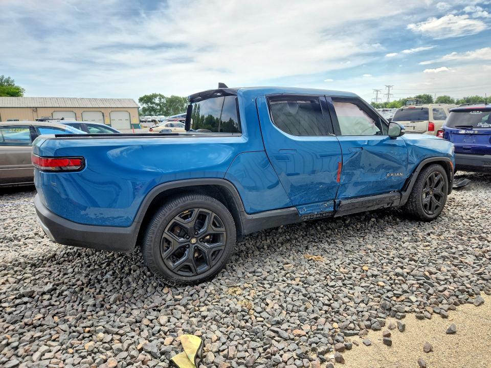 2023 Rivian R1t VIN 7FCTGBAA5PN027150 COPART salvage auction — SIDE, Il - Salvage Certificate, sold $17,200 on 2026-10-12 (photo 3)