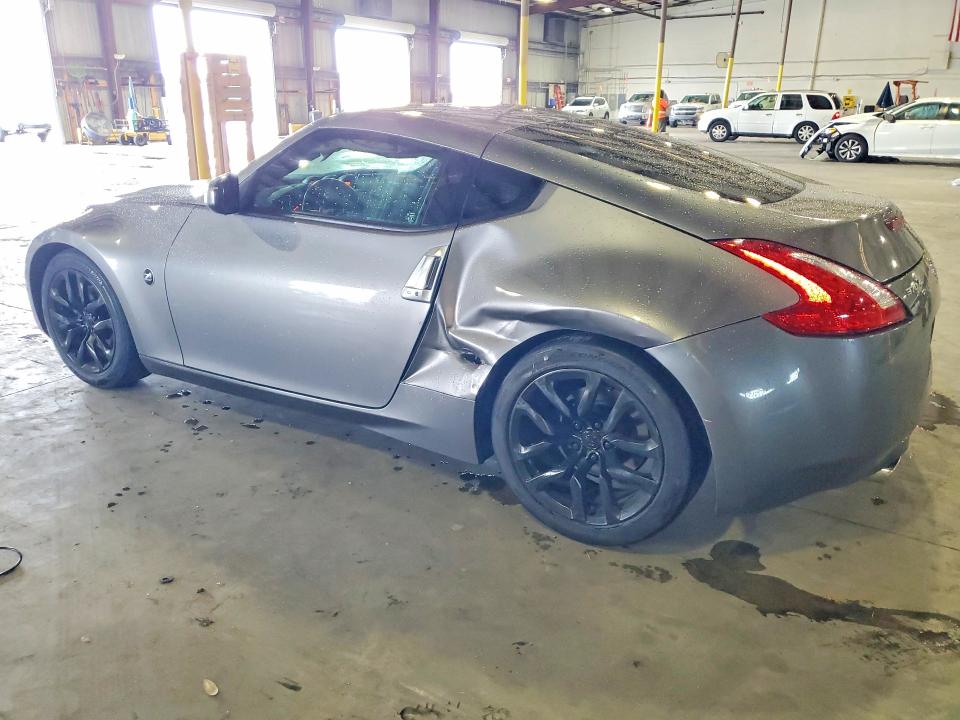 2015 Nissan VIN JN1AZ4EH7FM443976 COPART salvage auction — SIDE, Fl - Cert Of Title Slvg Rebuildable, sold $15 on 2026-07-29 (photo 2)