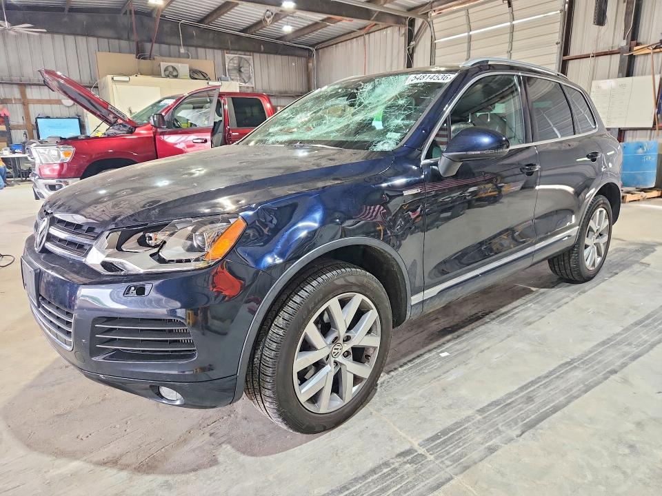 2014 Volkswagen Touareg VIN WVGEP9BPXED013575 COPART salvage auction — HAIL, Mo - Salvage Certificate Of Title, sold $1,550 on 2026-07-28 (photo 1)