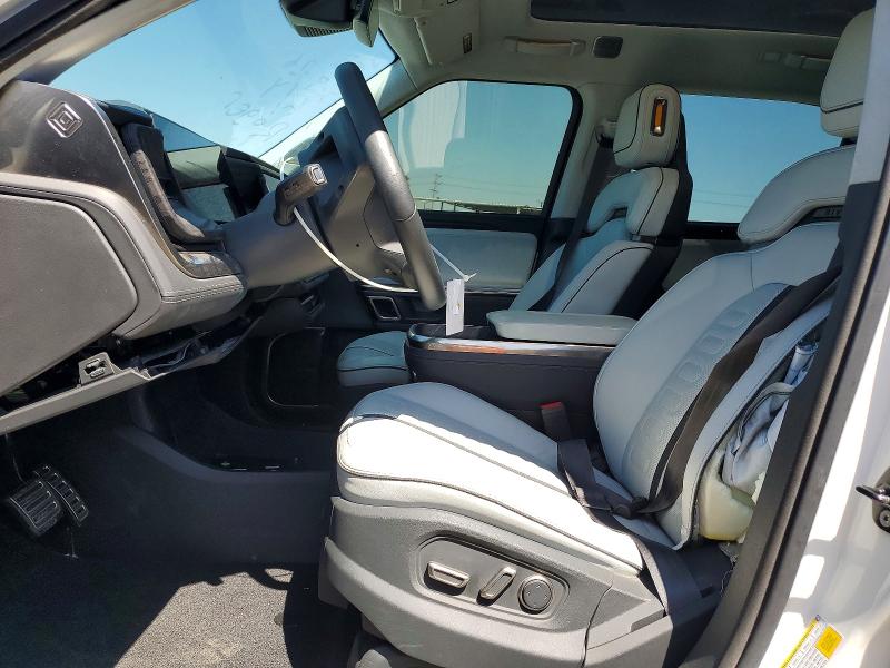 2022 Rivian VIN 7FCTGAAAXNN015566 COPART salvage auction — SIDE, Salvage Title, sold $19,500 on 2026-07-24 (photo 7)