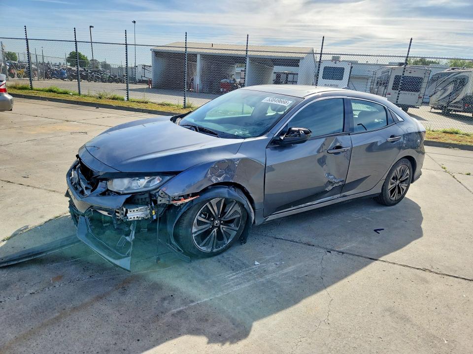 2018 Honda Civic VIN SHHFK7H57JU402497 COPART salvage auction — FRONT END, Ca - Salvage Certificate, sold $4,050 on 2026-07-06 (photo 1)