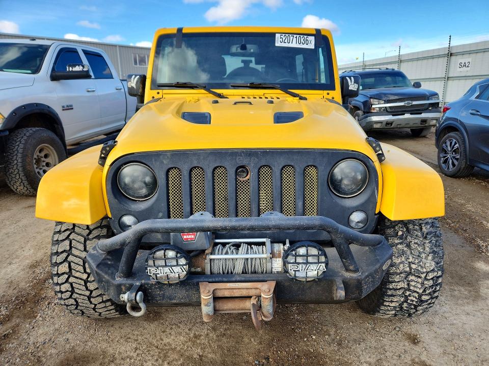 2015 Jeep Wrangler unlimited VIN 1C4BJWEG0FL552166 COPART salvage auction — SIDE, Ab - Bos - Rebuilt, sold $7,700 on 2026-07-16 (photo 5)
