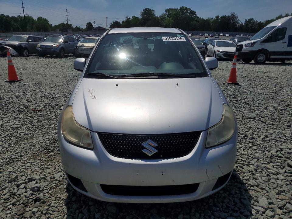 2012 Suzuki VIN JS2YC5A37C6303784 COPART salvage auction — SIDE, Nc - Salvage Certificate Of Title, sold $625 on 2026-07-08 (photo 5)