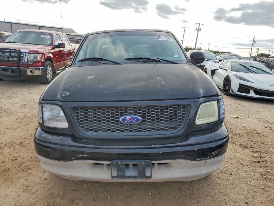 2003 Ford F-150 lightning VIN 1FTRX07W33KD10259 COPART salvage auction — SIDE, Tx - Salvage Vehicle Title, sold $450 on 2026-07-02 (photo 5)
