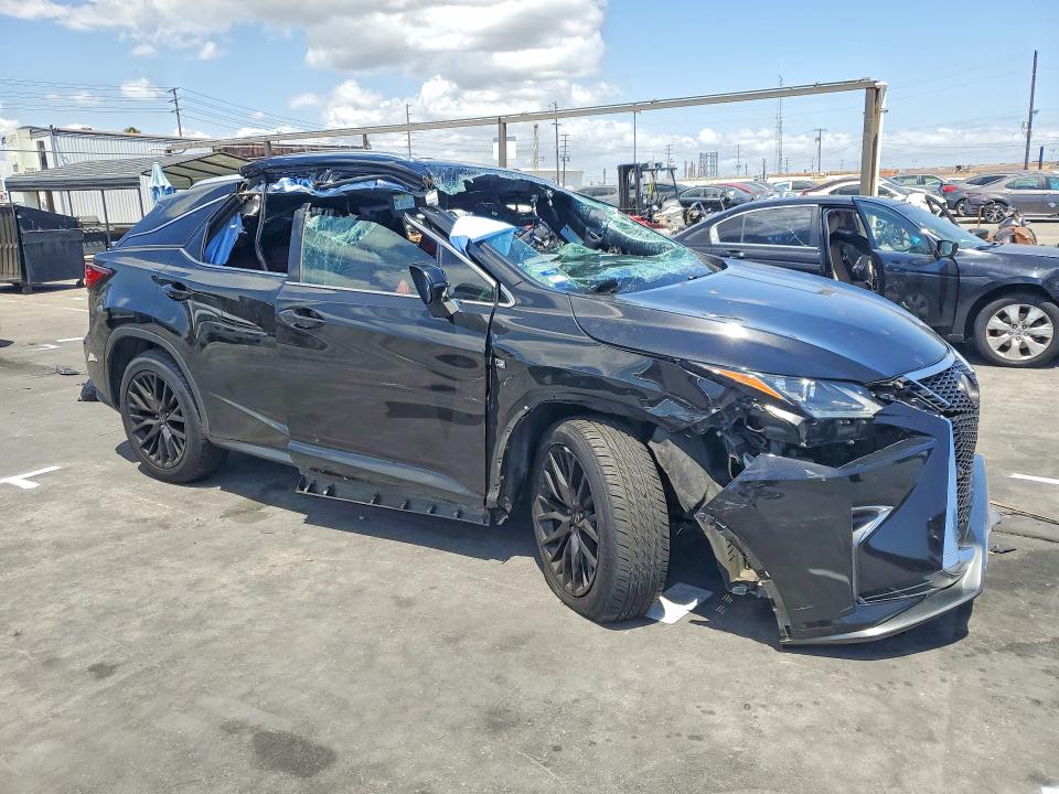 2018 Lexus Rx VIN 2T2BZMCA4JC157219 COPART salvage auction — ROLLOVER, Ca - Salvage Certificate, sold $4,500 on 2026-07-02 (photo 4)