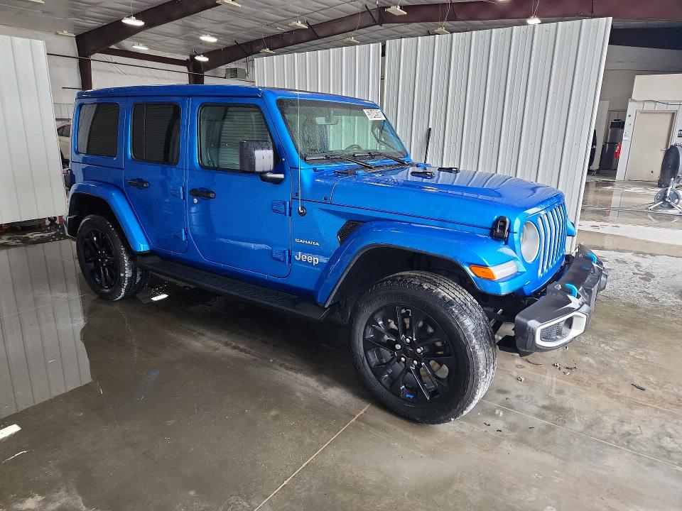 2023 Jeep Wrangler / VIN 1C4JJXP68PW538912 COPART salvage auction — MINOR DENT/SCRATCHES, Mo - Certificate Of Title, sold $20,250 on 2026-07-02 (photo 4)