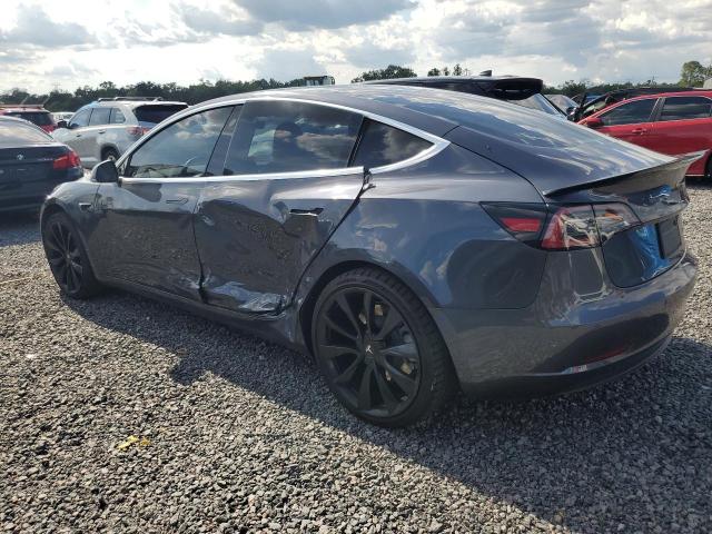2019 Tesla Model 3 VIN 5YJ3E1EB4KF529972 COPART salvage auction — SIDE, Fl - Cert Of Title Slvg Rebuildable, sold $6,700 on 2026-07-10 (photo 2)
