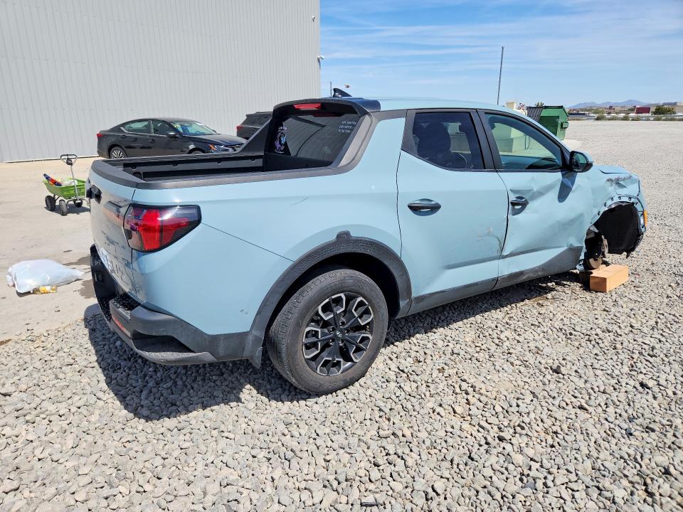 2024 Hyundai Santa cruz VIN 5NTJBDDE6RH110497 COPART salvage auction — SIDE, Nv - Salvage Title, sold $7,500 on 2026-07-09 (photo 3)