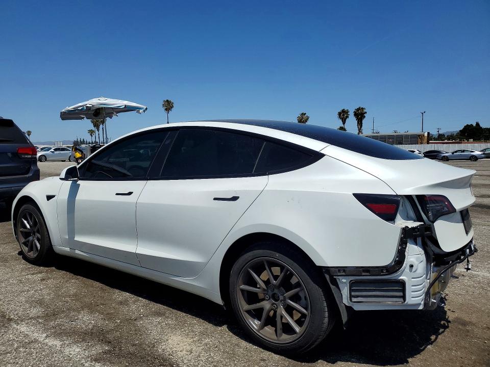 2023 Tesla Model 3 VIN 5YJ3E1EA2PF587769 COPART salvage auction — REAR END, CA - SALVAGE CERTIFICATE, sold $9,500 on 2026-07-28 (photo 2)