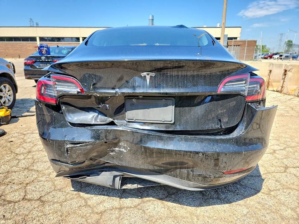 2022 Tesla Model 3 VIN 5YJ3E1EA3NF304650 COPART salvage auction — REAR END, Il - Salvage Certificate, sold $4,000 on 2026-07-06 (photo 6)