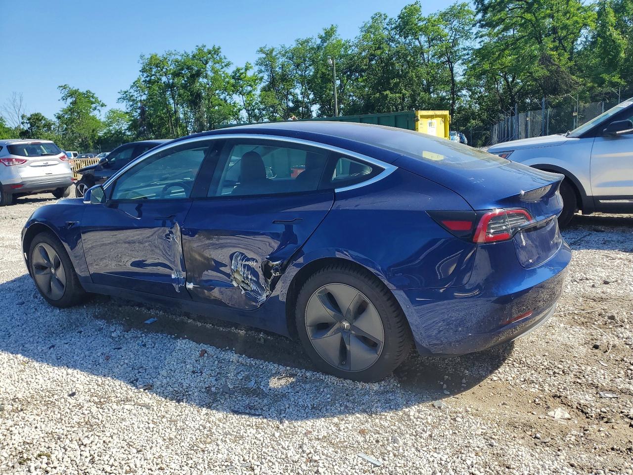 2018 Tesla Model 3 VIN 5YJ3E1EA6JF017006 COPART salvage auction — Side, MD - CERTIFICATE OF TITLE (P), sold $5,900 on 2026-07-03 (photo 2)